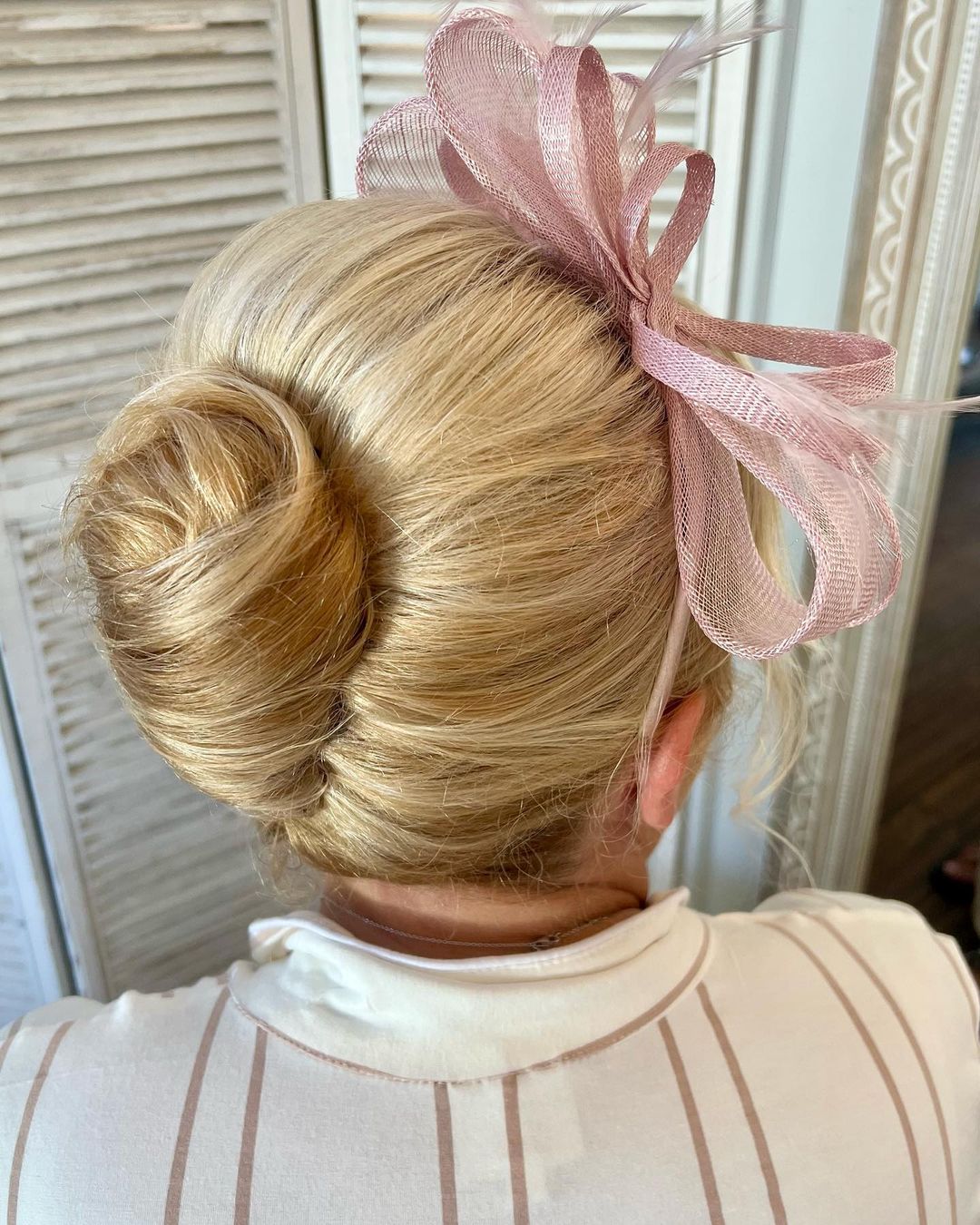 French Roll Updo with Statement Accessory