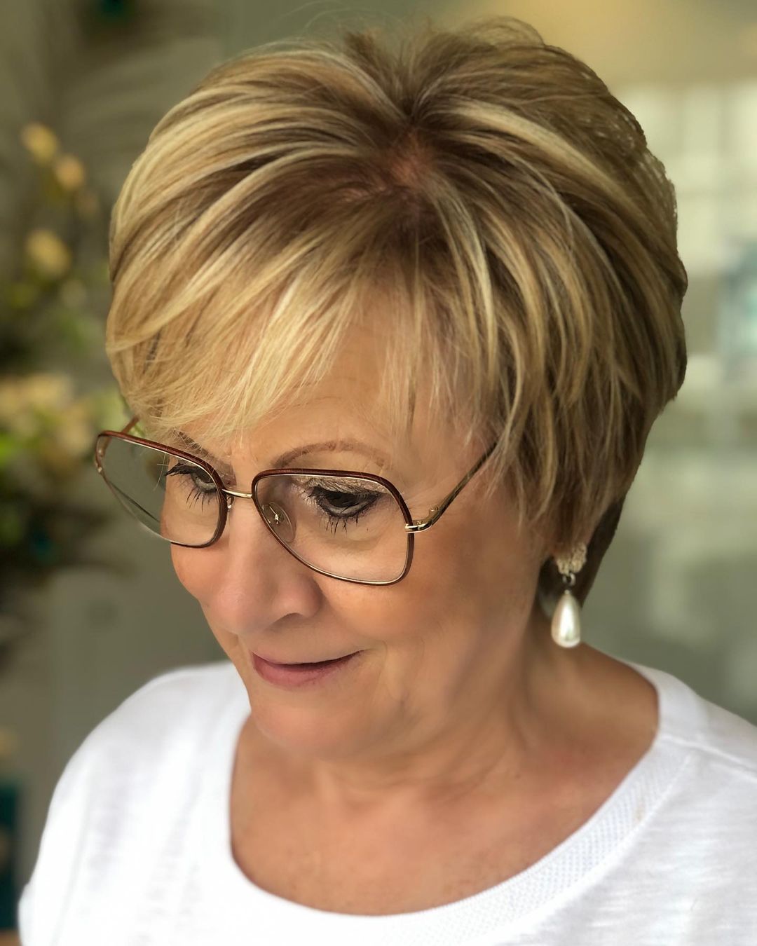 Short Feathered Hairstyle with Glasses