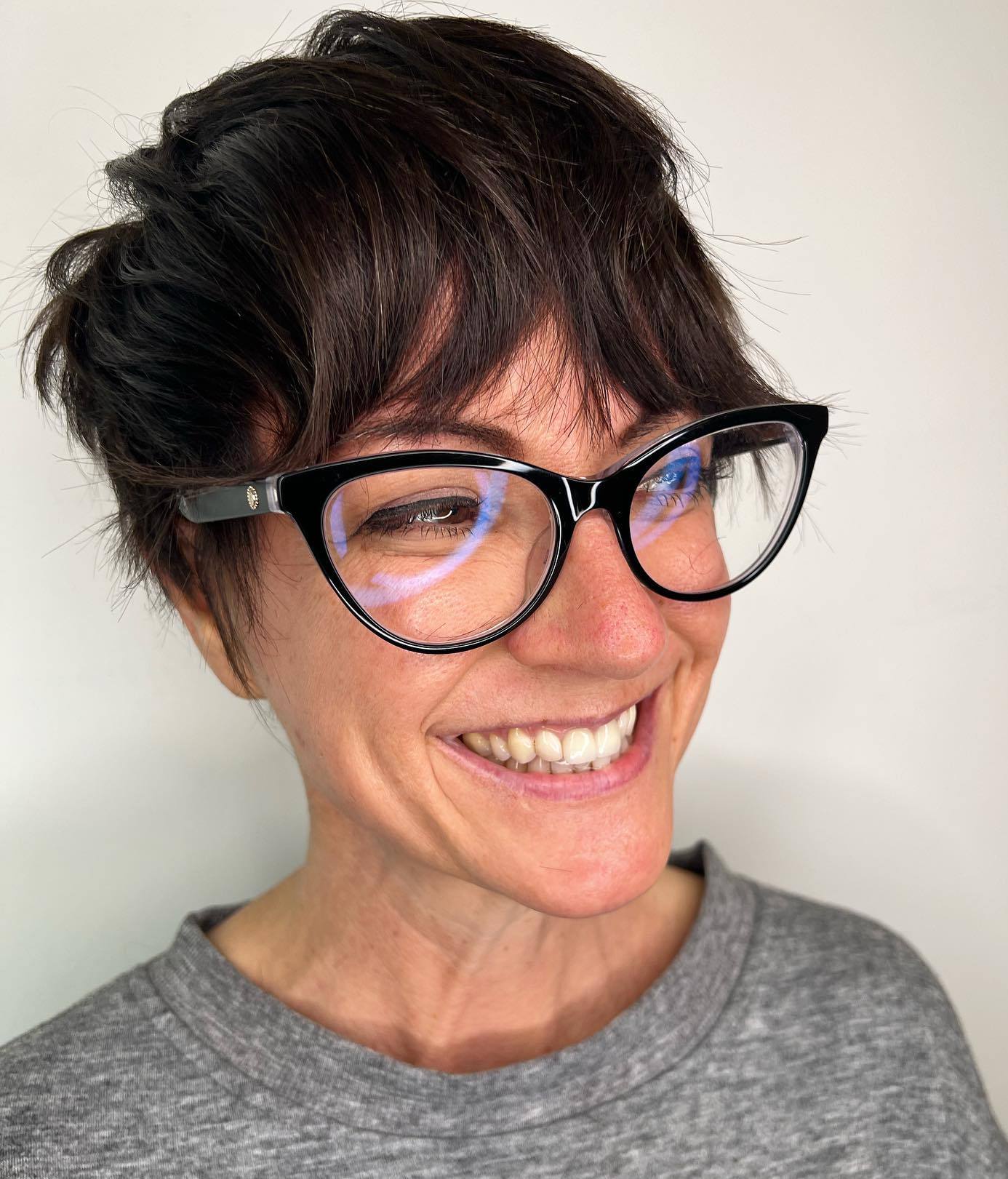 Fun Short Layered Cut with Glasses