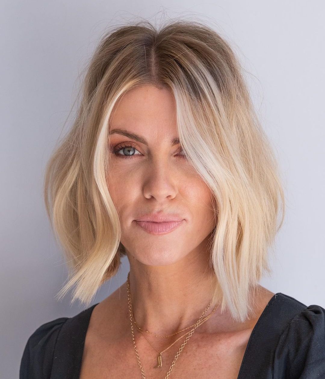 Feminine Blonde Bob with Root Fade