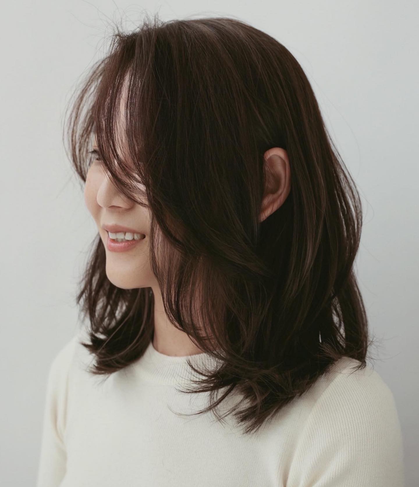 Medium Layered Brunette Hairstyle